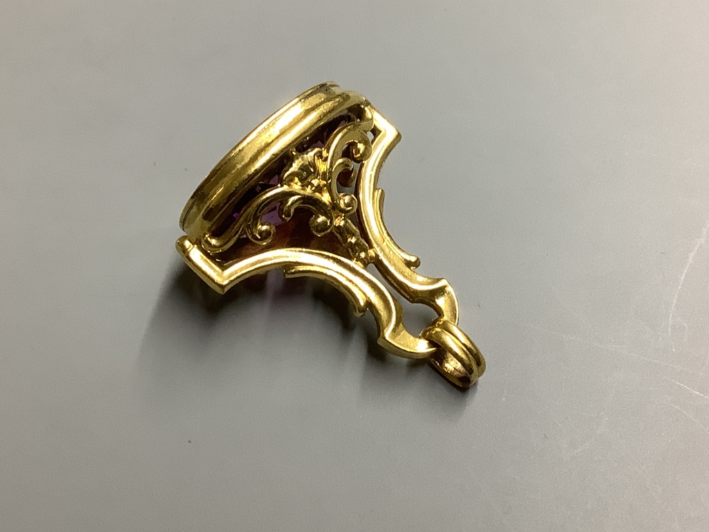 A yellow metal overlaid and amethyst set fob seal